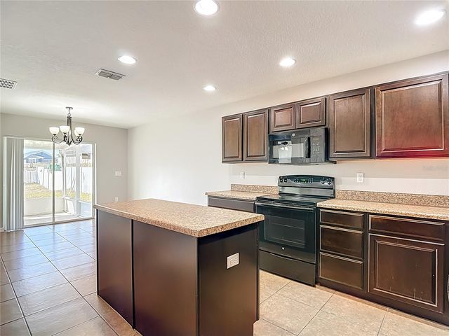 13221 WATERFORD CASTLE DRIVE, Dade City, FL 33525