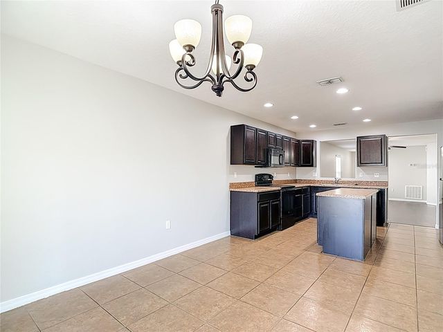 13221 WATERFORD CASTLE DRIVE, Dade City, FL 33525