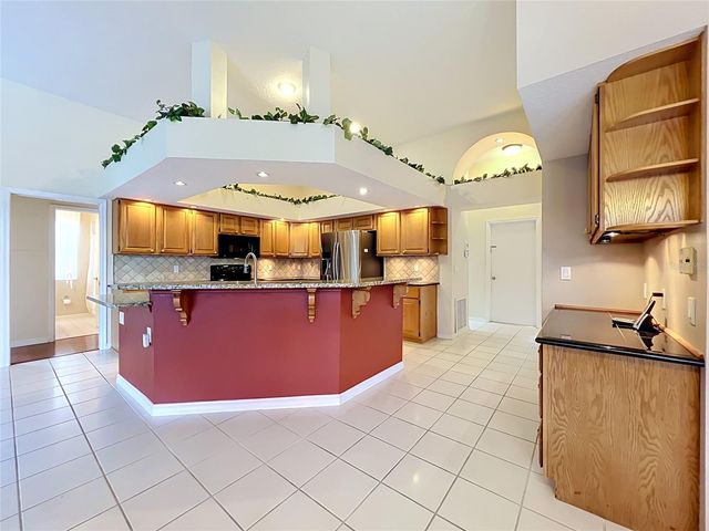 1104 NEEDLEWOOD LOOP, Oviedo, FL 32765