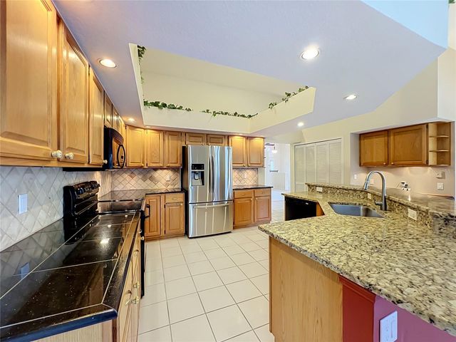 1104 NEEDLEWOOD LOOP, Oviedo, FL 32765