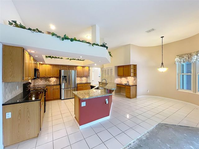 1104 NEEDLEWOOD LOOP, Oviedo, FL 32765