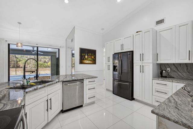 221 Cypress Trace, Royal Palm Beach, FL 33411