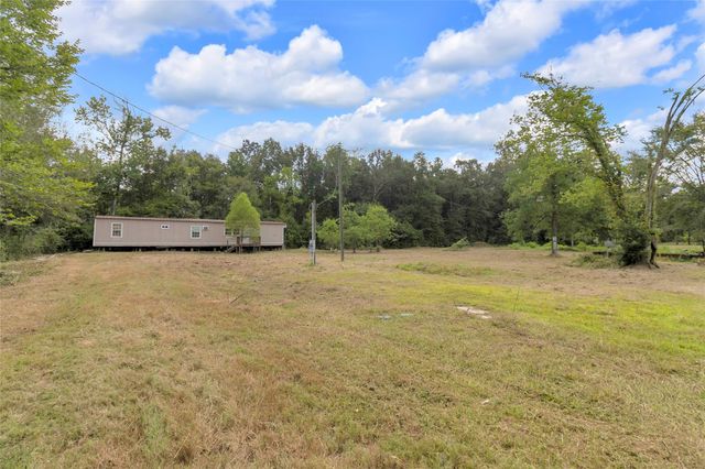 310 County Road 3280, Cleveland, TX 77327