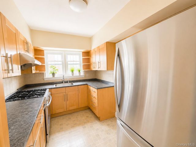 8018 217th, Hollis Hills, NY 11427
