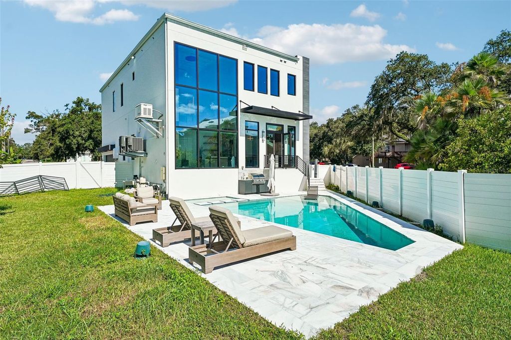 Image 60 of property listing at 8103 N RIVER SHORE DRIVE, Tampa, FL 33604