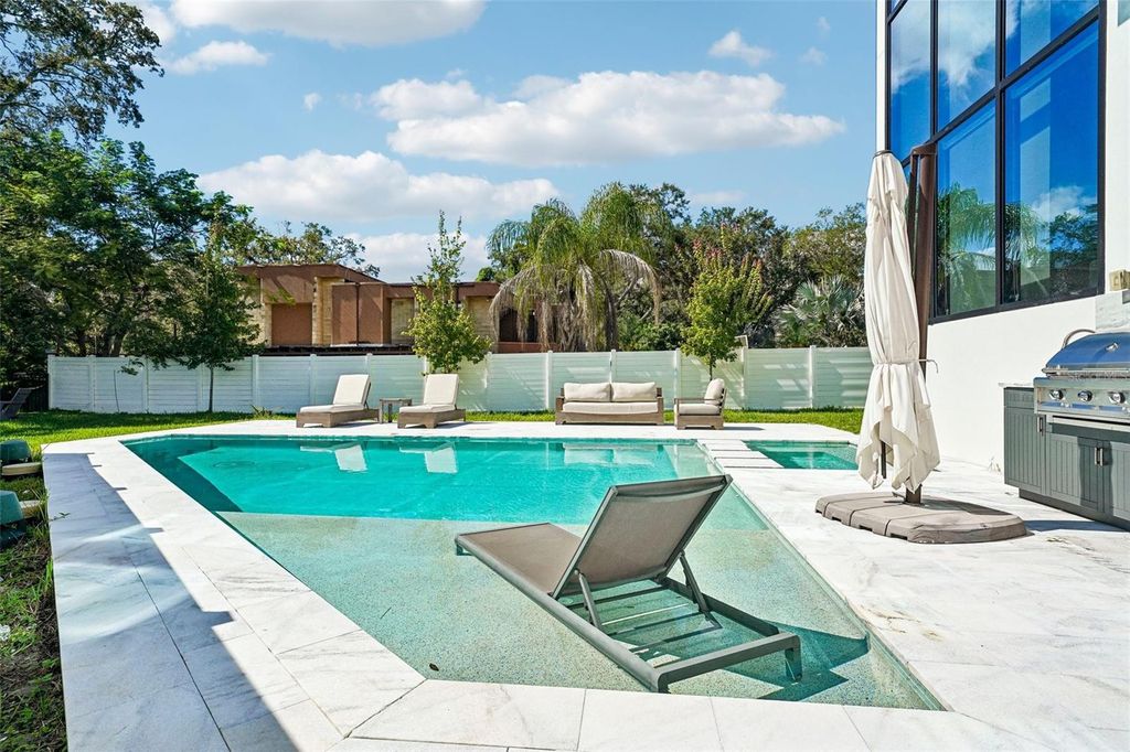 Image 65 of property listing at 8103 N RIVER SHORE DRIVE, Tampa, FL 33604
