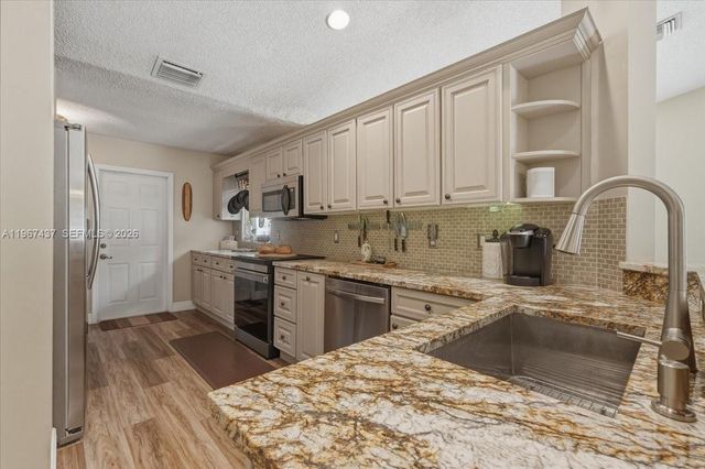 12640 SW 7th Pl, Davie, FL 33325