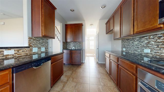 20254 Fossil Valley Lane, Cypress, TX 77433