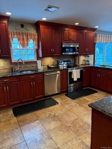 90 Pacific Street, Massapequa Park, NY 11762