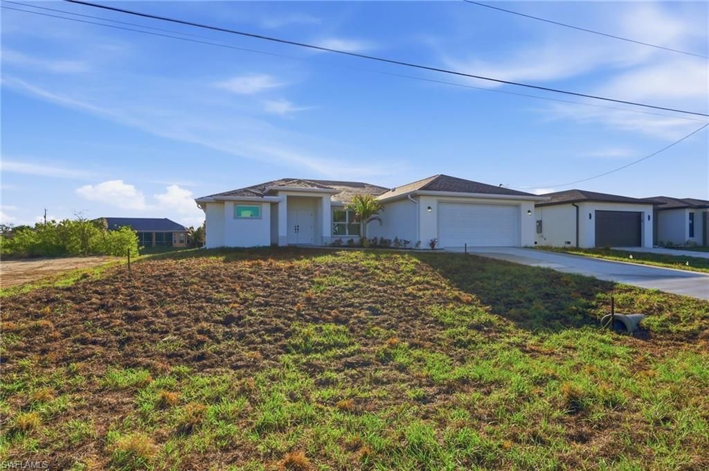 2105 NE 1st AVE, CAPE CORAL, FL 33909 — photo 2