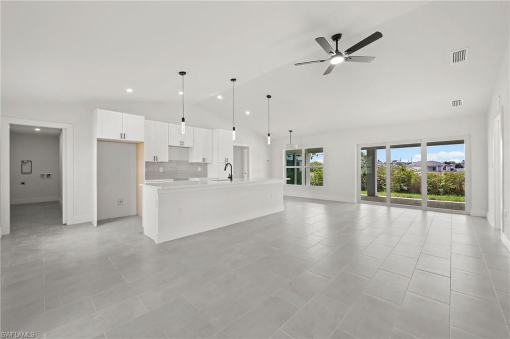Image 1 of property listing at 4446 Connection AVE, Cape Coral, FL 33909
