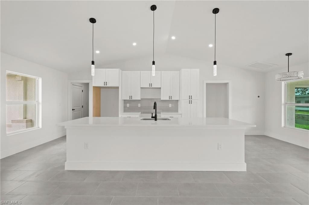 Image 2 of property listing at 4446 Connection AVE, Cape Coral, FL 33909