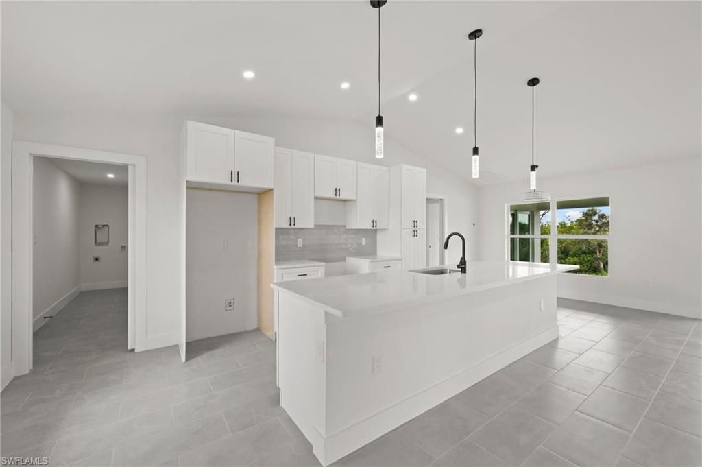 Image 32 of property listing at 4446 Connection AVE, Cape Coral, FL 33909