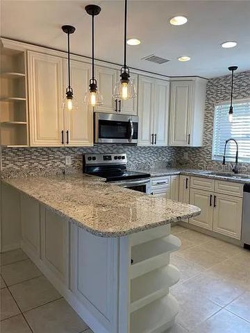 1424 CHESTERFIELD DRIVE, Dunedin, FL 34698