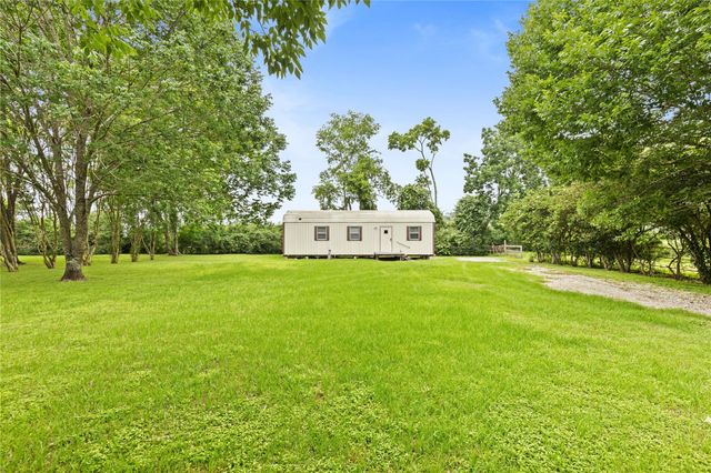 12039 Anderson Road, Willis, TX 77318