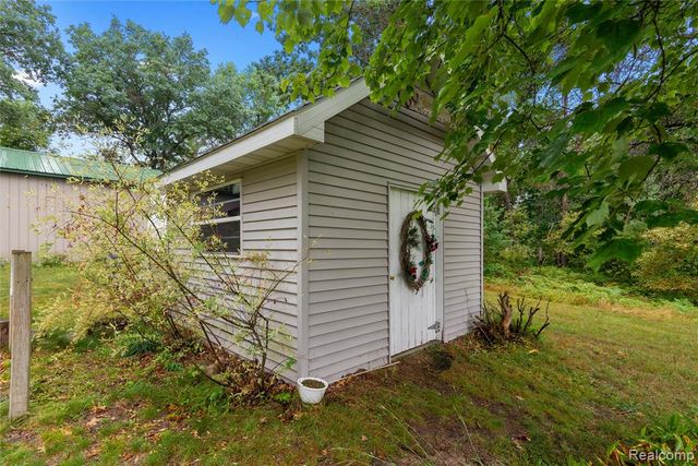 322 E Pere Cheney Road, Roscommon, MI 48653