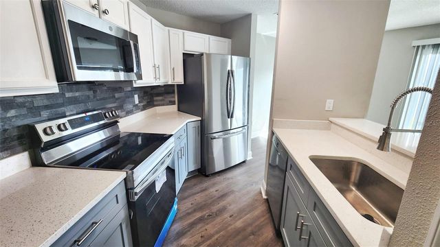 2528 WOODGATE BOULEVARD 102, Orlando, FL 32822