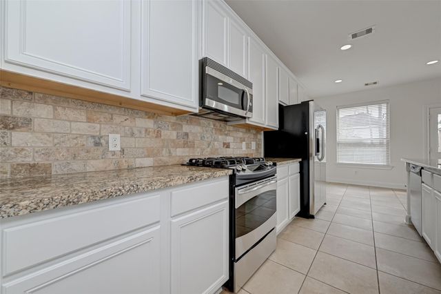 71 N Rocky Point Circle, The Woodlands, TX 77389