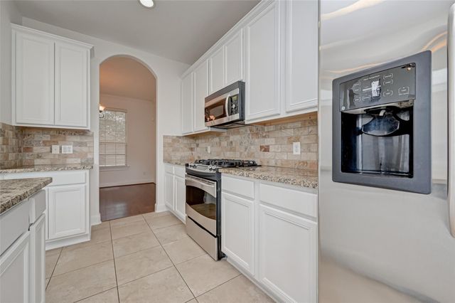 71 N Rocky Point Circle, The Woodlands, TX 77389