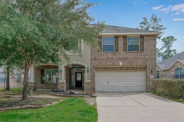 71 N Rocky Point Circle, The Woodlands, TX 77389