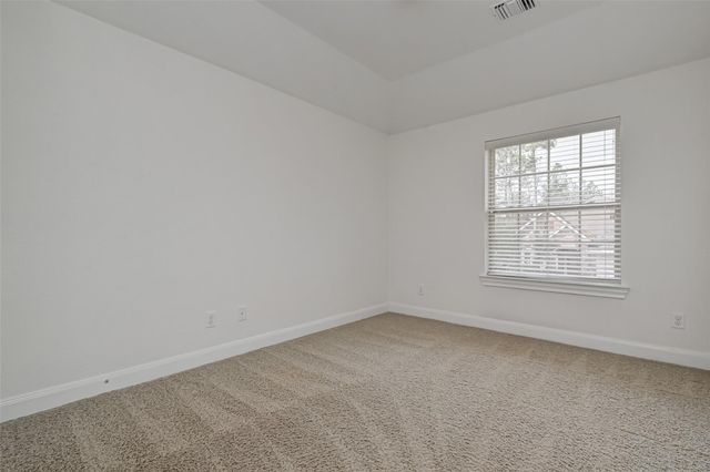 71 N Rocky Point Circle, The Woodlands, TX 77389