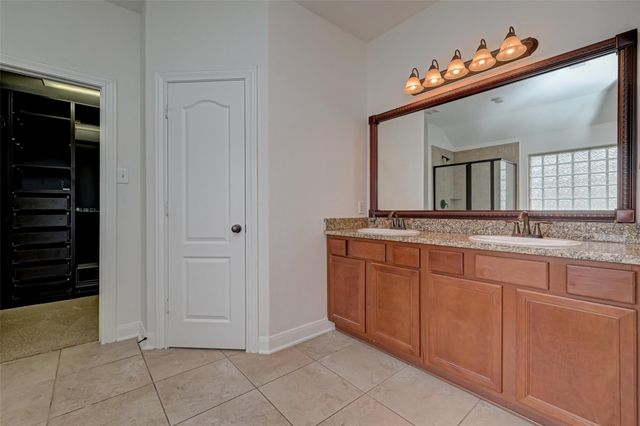 71 N Rocky Point Circle, The Woodlands, TX 77389