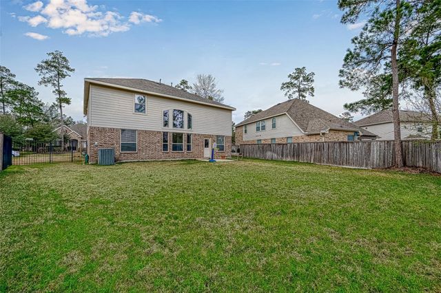 71 N Rocky Point Circle, The Woodlands, TX 77389