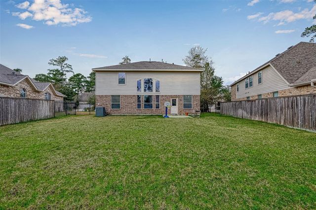 71 N Rocky Point Circle, The Woodlands, TX 77389