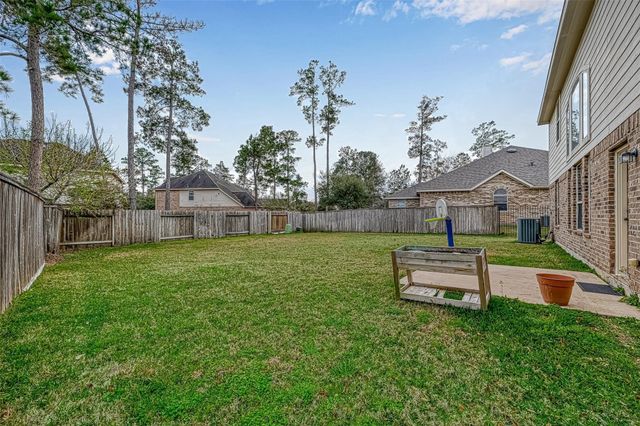 71 N Rocky Point Circle, The Woodlands, TX 77389