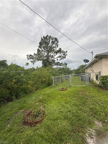 1106 Summa Blvd, Lehigh Acres, FL 33974