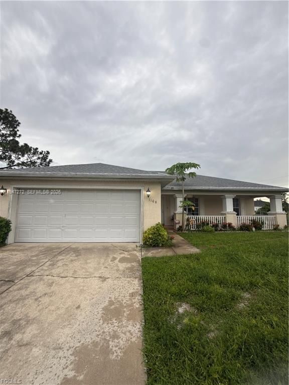 1106 Summa Blvd, Lehigh Acres, FL 33974