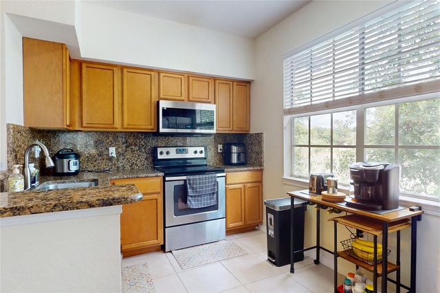 2598 ROBERT TRENT JONES DRIVE 1030, Orlando, FL 32835