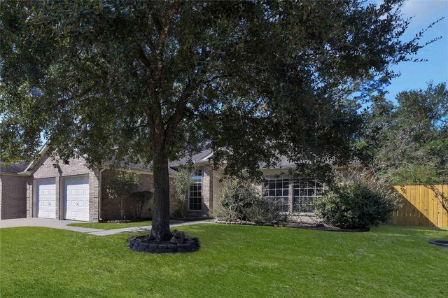 27186 Kings Manor Drive S, Humble, TX 77339