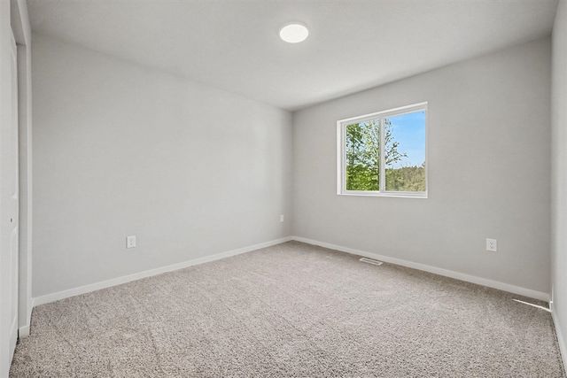 1002 Cedarwood Drive, Greenville, MI 48838