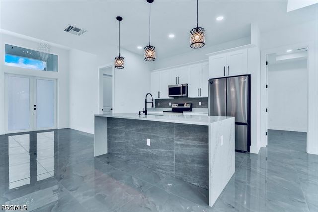654 Trinity ST E, Lehigh Acres, FL 33974