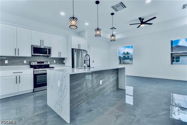 654 Trinity ST E, Lehigh Acres, FL 33974