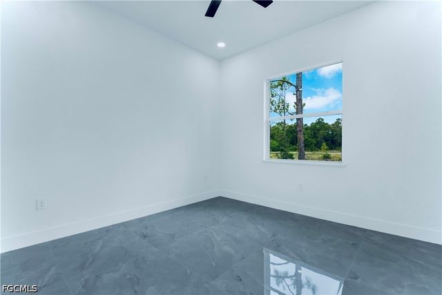 654 Trinity ST E, Lehigh Acres, FL 33974