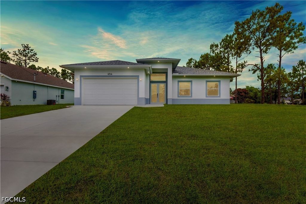 654 Trinity ST E, Lehigh Acres, FL 33974