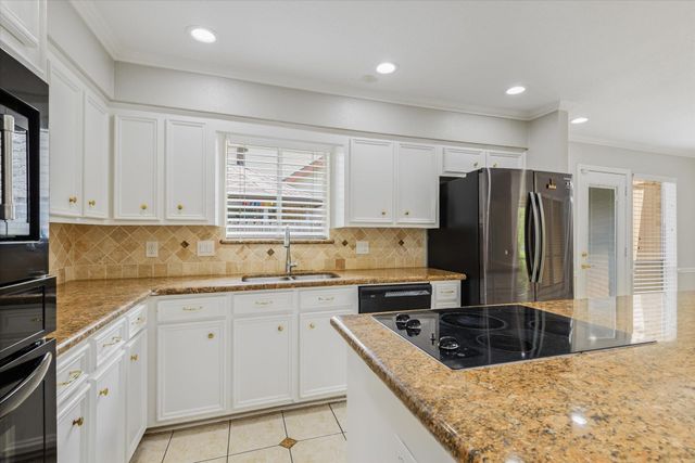 7715 Brush Wood Drive, Houston, TX 77088