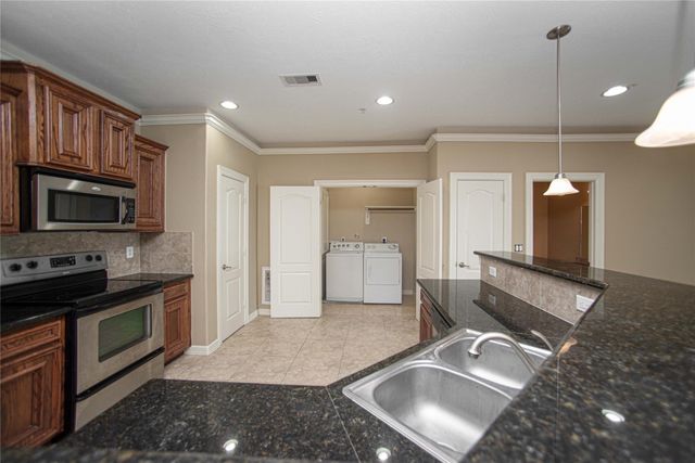 7037 Kingston Cove Lane 316, Willis, TX 77318