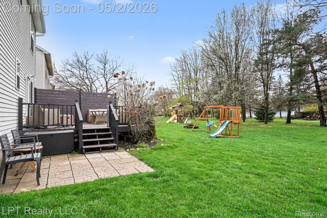 406 Mill Pond Drive, Fenton, MI 48430