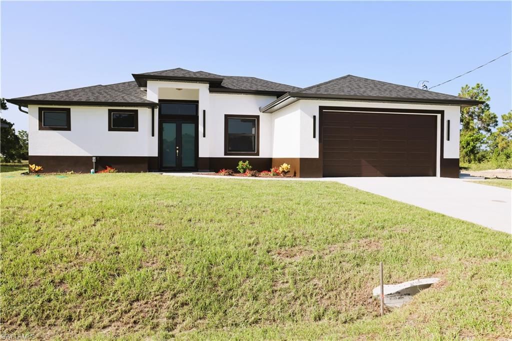 1216 Delores ST E, LEHIGH ACRES, FL 33974 — exterior