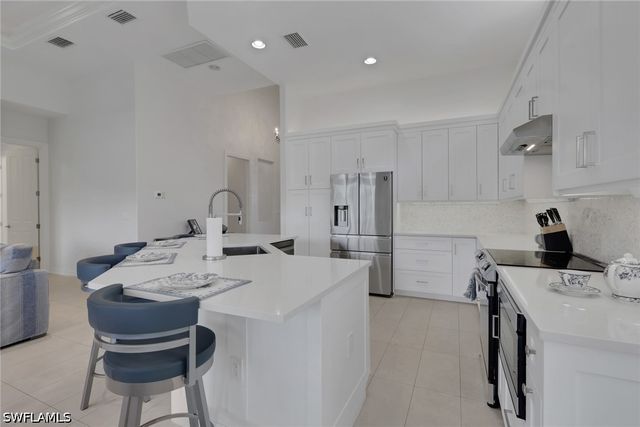 7832 Valencia CT, Naples, FL 34113