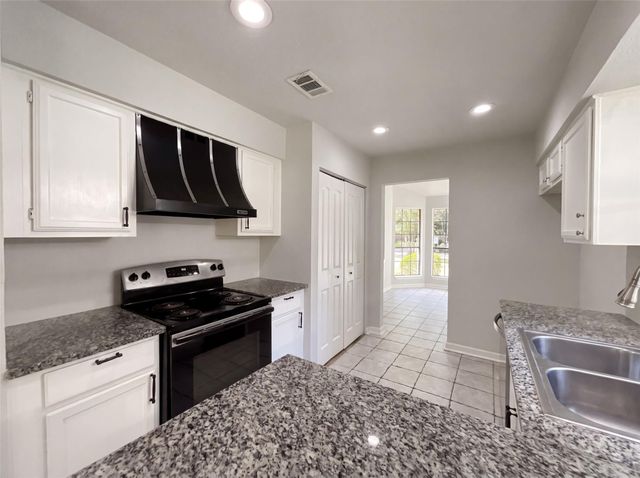 4911 Creek Shadows Drive, Houston, TX 77339