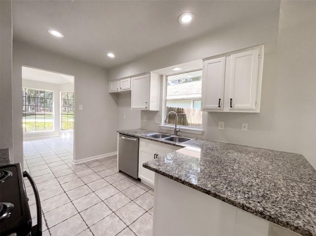 4911 Creek Shadows Drive, Houston, TX 77339