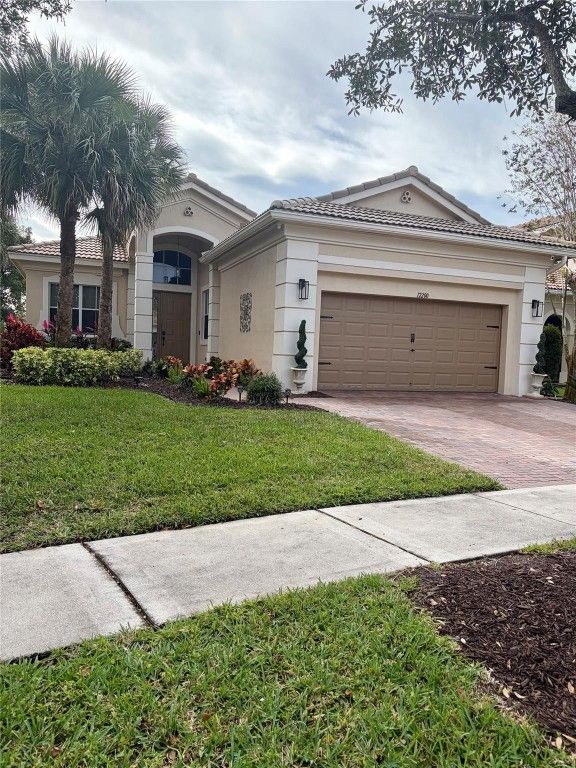 Image 2 of property listing at 12200 NW 77th Manor, Parkland, FL 33076