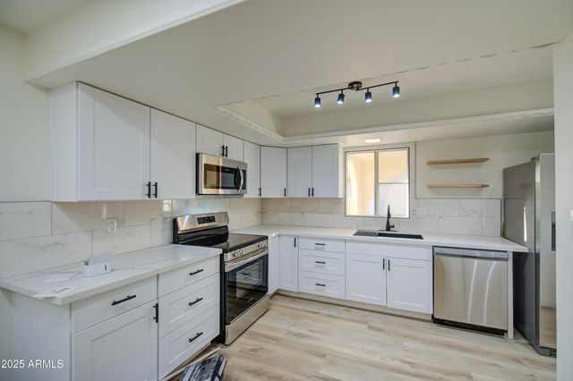 26405 S SNEAD Drive, Sun Lakes, AZ 85248