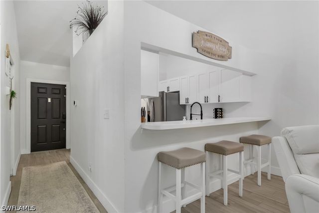 241 Robin Hood CIR 202, Naples, FL 34104