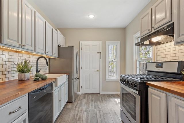 65 Woodcock Street, Lowell, MA 01854