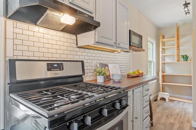65 Woodcock Street, Lowell, MA 01854